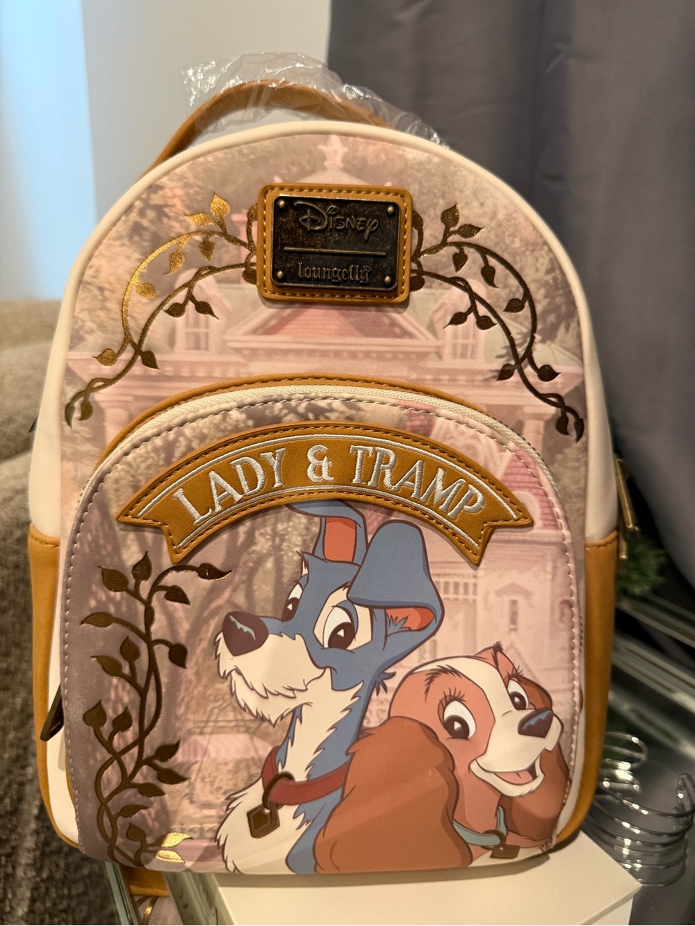 Loungefly Disney Lady & The Tramp Mini Backpack in Pink, Blue, Brown & Gold